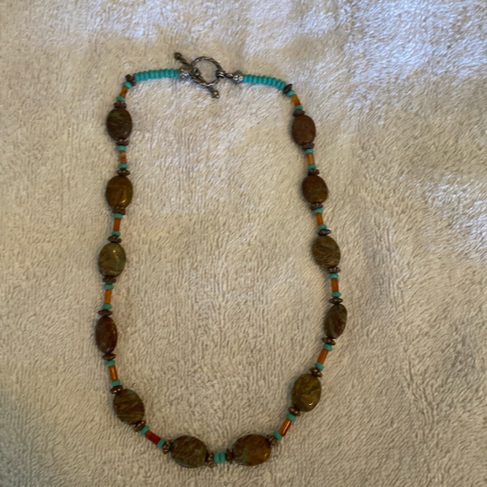 Gorgeous turquoise and silver with gorgeous brown stones